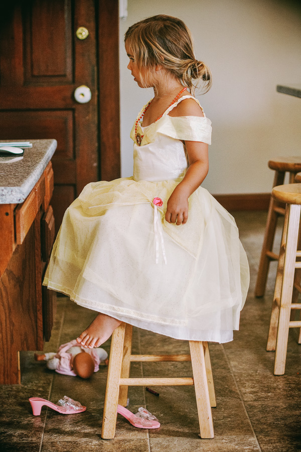 toddler girl dressed up with princess dress